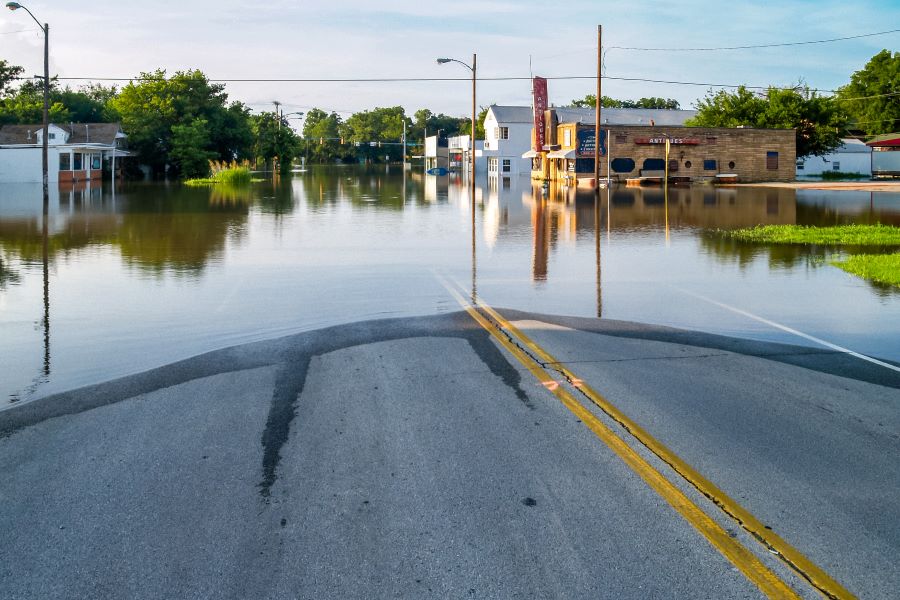 street with a puddle from flooding