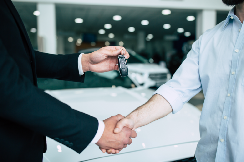 Hand shake nd handing over car keys