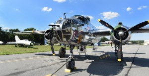 front end of silver plane parked on runway