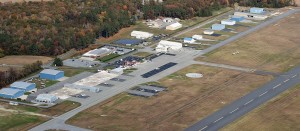 aerial partial view of runway with hangars