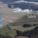 aerial view of sussex airport promoting upgrades take flight