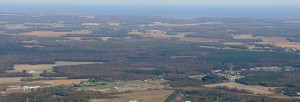 aerial view of delaware land with beach off in distance