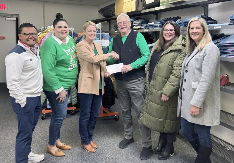 a group of people standing in a store