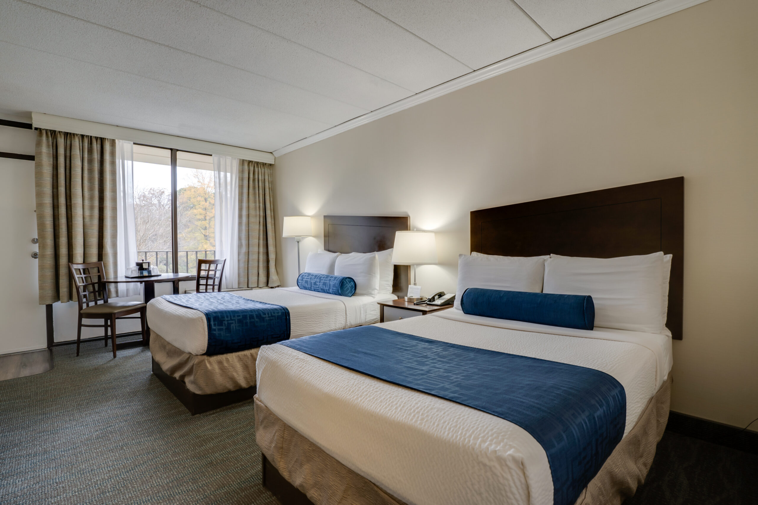 hotel room with 2 double beds