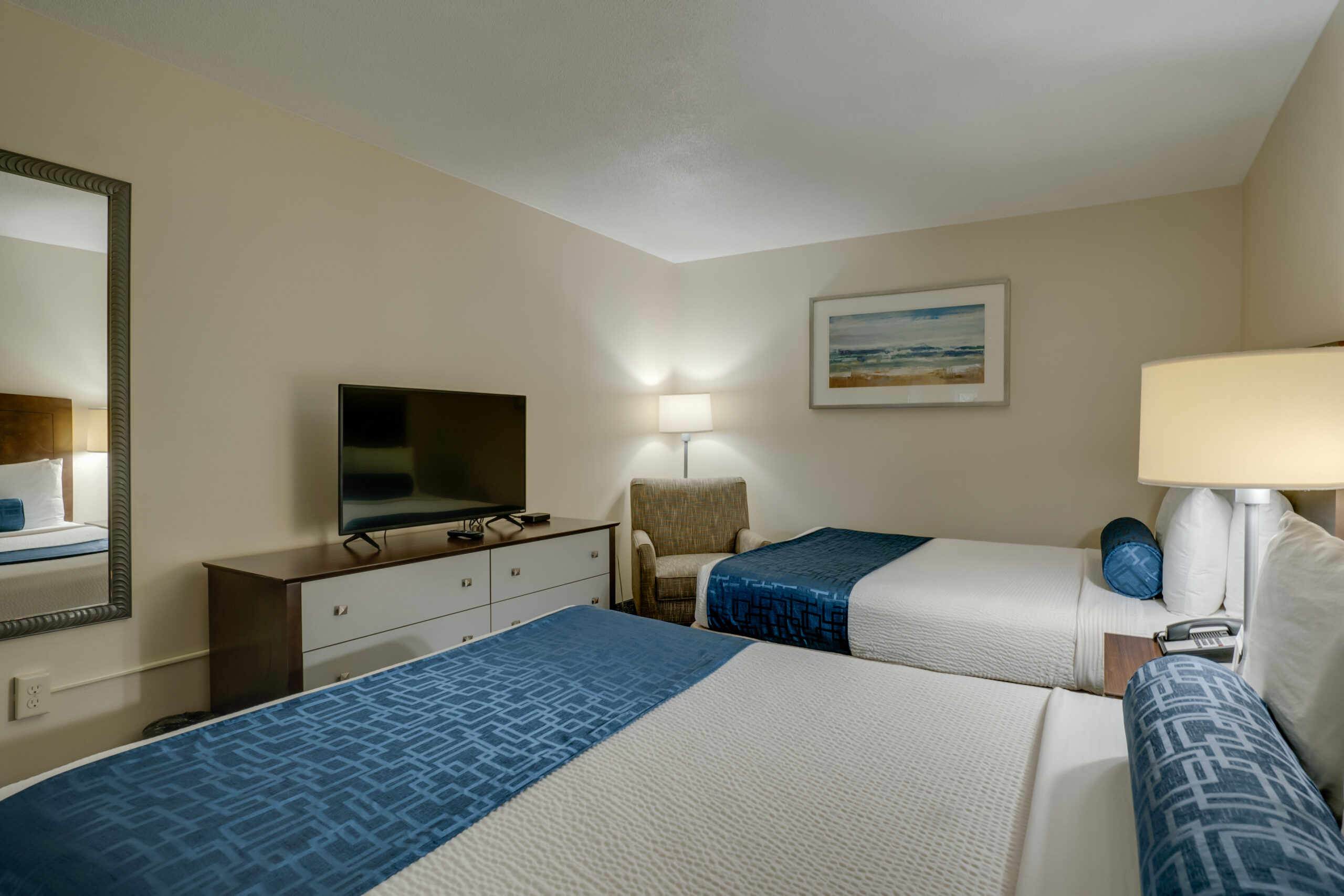 hotel suite with 2 beds