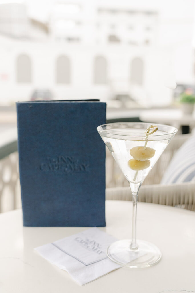 the Inn of Cape May menu and a martini with olives