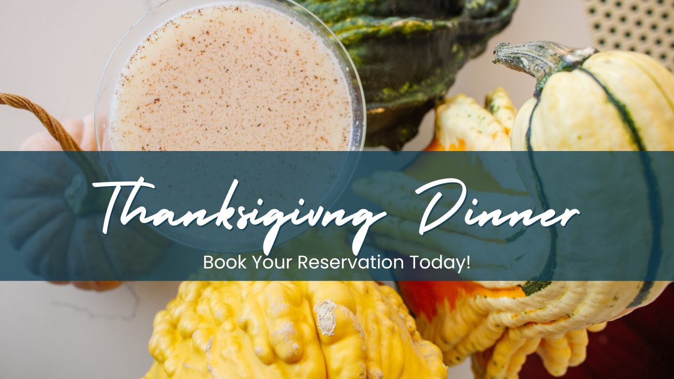 a thanksgiving dinner with pumpkins and gourds