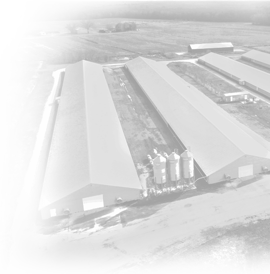 a black and white photo of a factory building