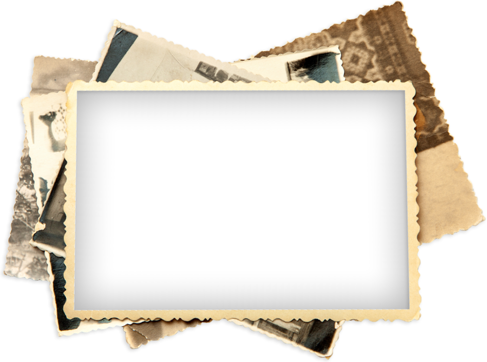 a pile of old photos with a black background