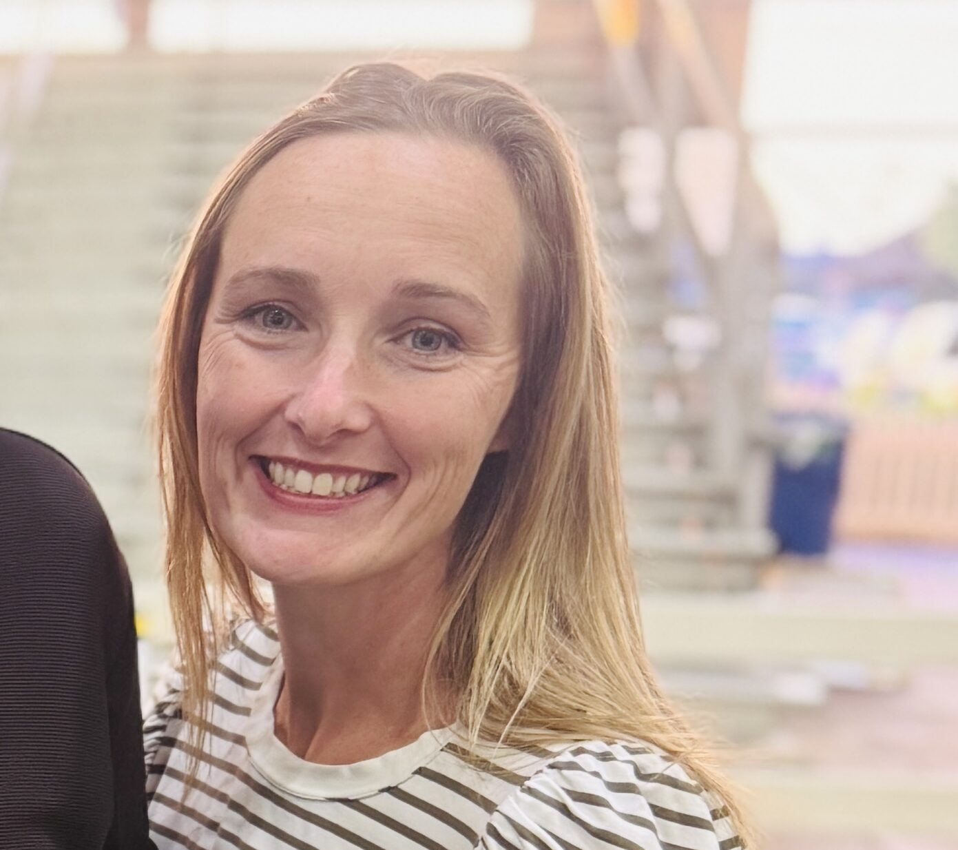 a man and a woman standing next to each other