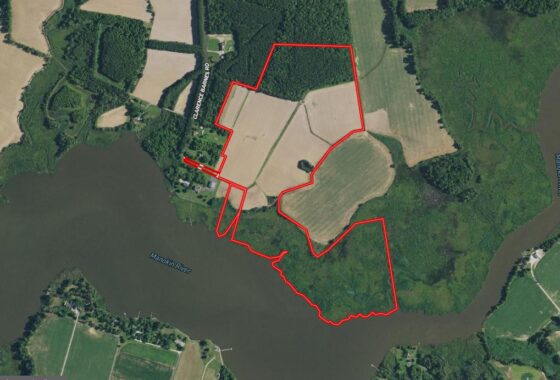 an aerial view of a land with a red line in the middle of it