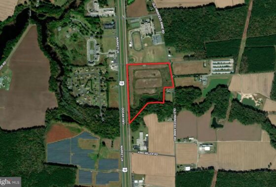 an aerial view of a field with a red line