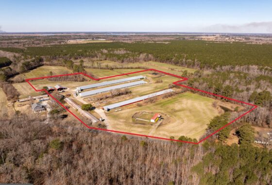 an aerial view of a farm and farm land