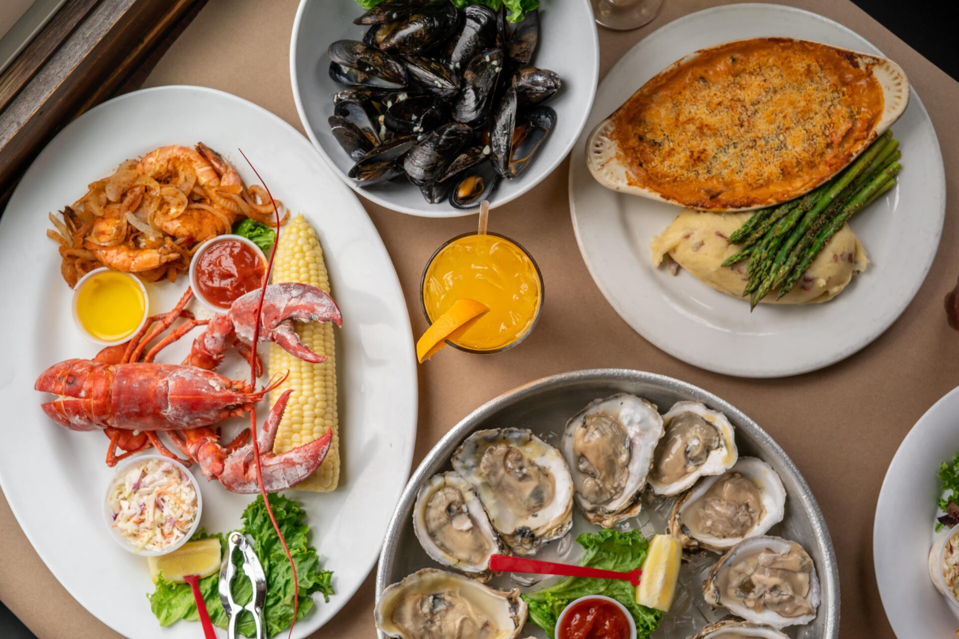Various Lobster Shanty menu items on a table.