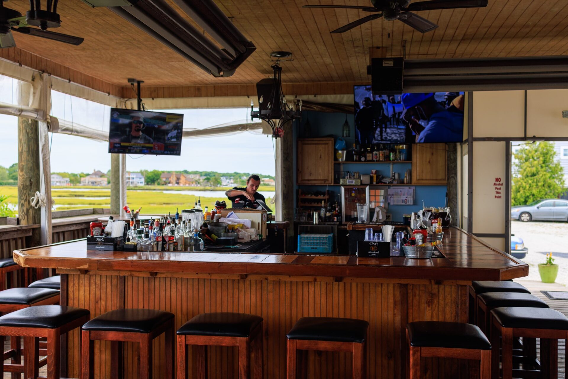 The Lobster Shanty full bar with multiple bar seats.