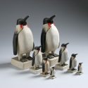 Collection of wooden carved penguin sculptures