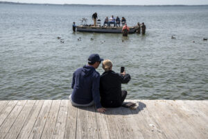 Watching judging on the bay at the 2025 Ward World Championship [Photo by Alan Wycheck]