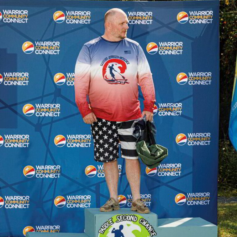 a man standing on top of a podium