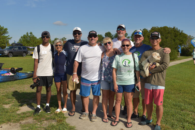 a group of people posing for a picture