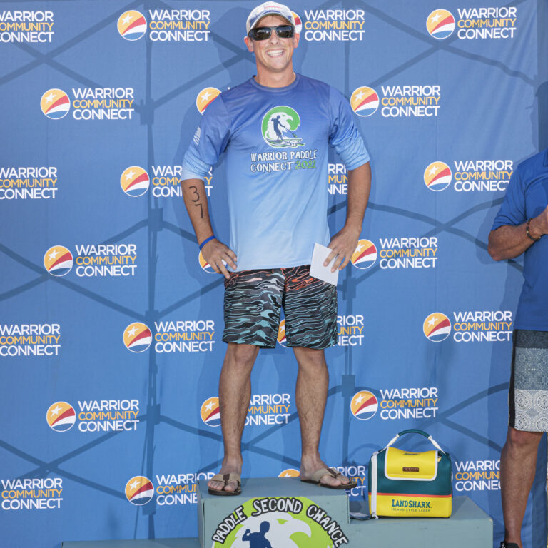 a man standing on top of a podium