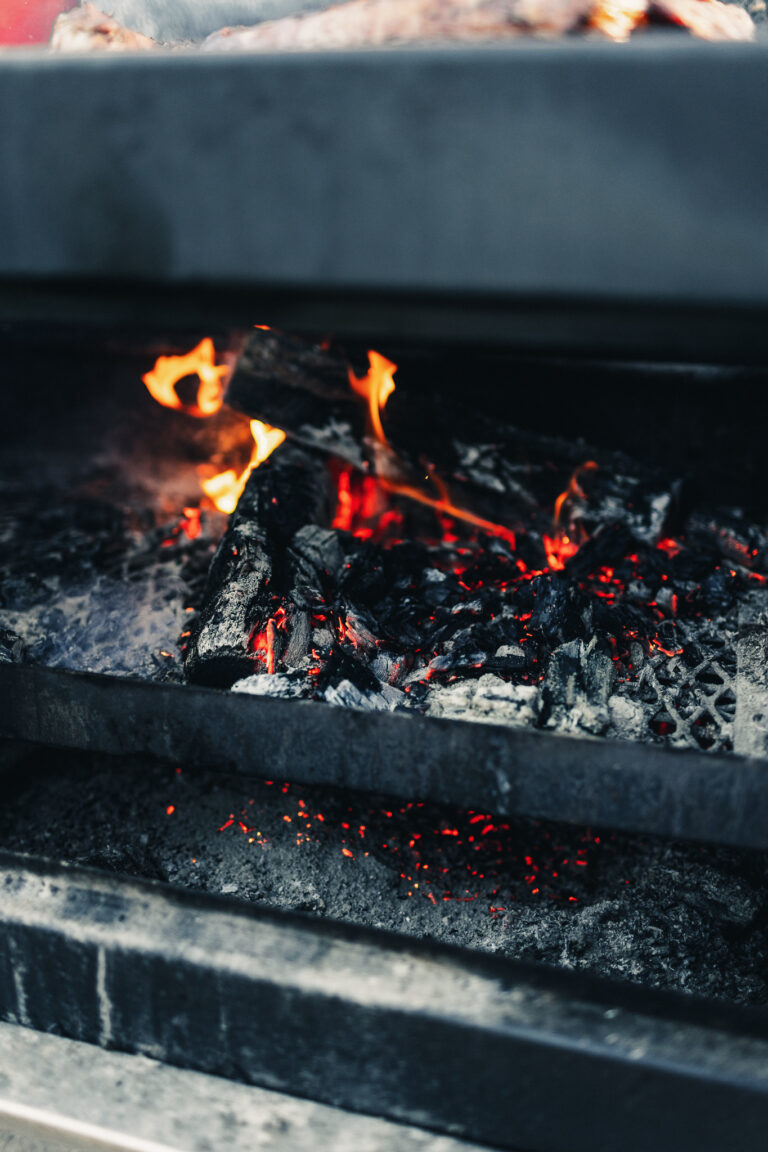 a close up of food cooking on a grill