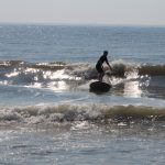boy practicing surf techniques