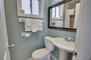 white bath towels soap toilet