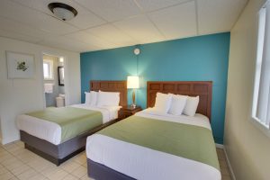 two double beds tile teal