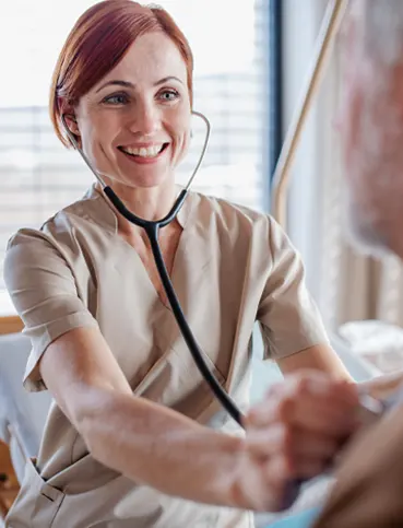 a woman with a stethoscope on her neck