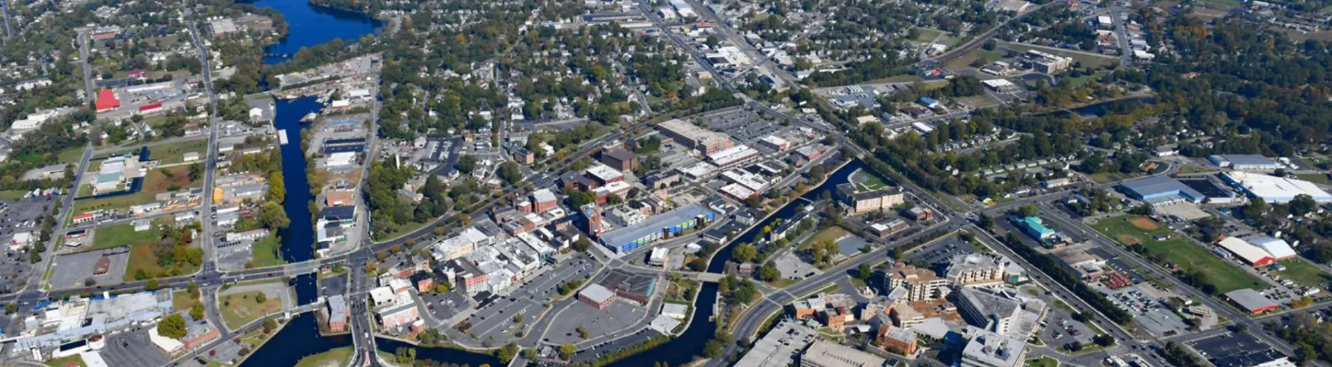 an aerial view of a city with a river running through it