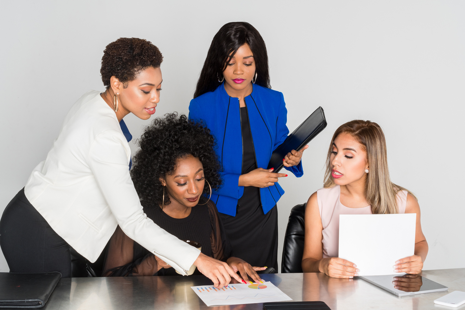 Group of businesswomen working together in an office