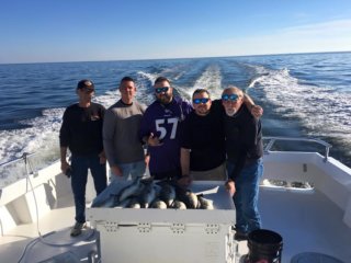 group fishing on boat
